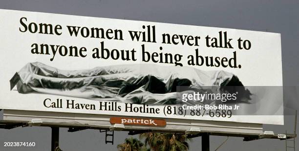 Billboard depicting an abused dead female in body bag displayed of city streets during the OJ Simpson Trial, circa June 1, 1994 in Los Angeles,...