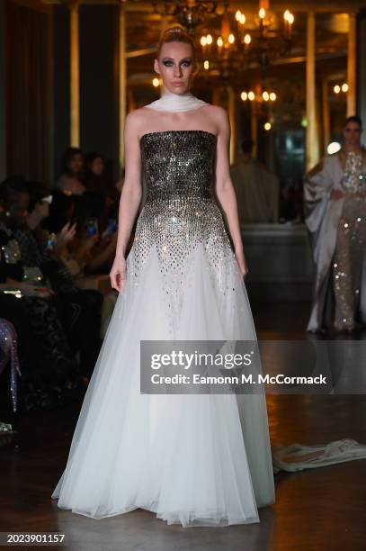 Model walks the runway at the Atelier Zuhra show during London Fashion Week February 2024 at Cafe Royal on February 18, 2024 in London, England.