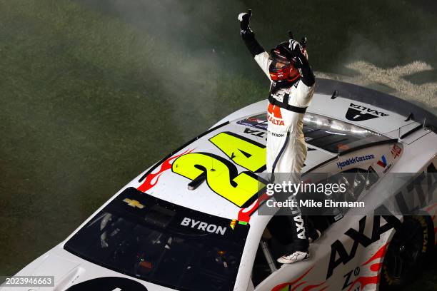 William Byron, driver of the Axalta Chevrolet, celebrates after winning the NASCAR Cup Series Daytona 500 at Daytona International Speedway on...