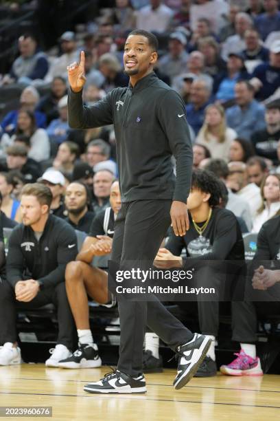 Head coach Kim English of the Providence Friars signals to his players during a college basketball game against the Villanova Wildcats at Wells Fargo...