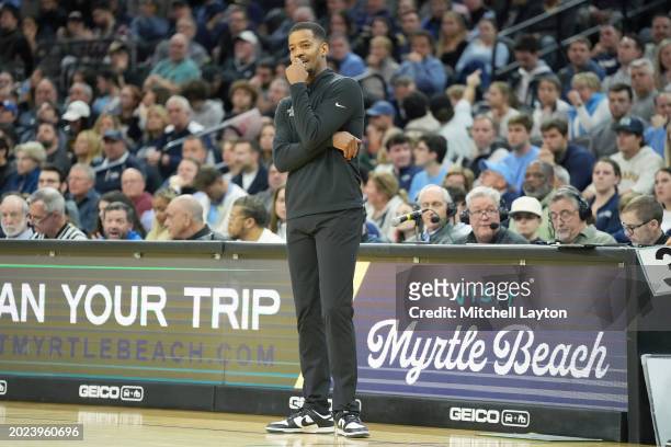 Head coach Kim English of the Providence Friars looks on during a college basketball game against the Villanova Wildcats at Wells Fargo Center on...