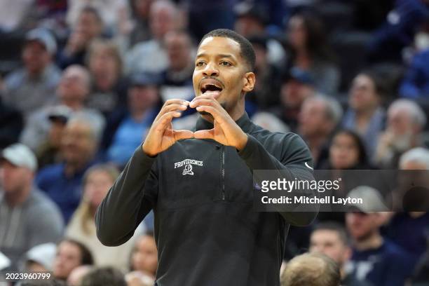 Head coach Kim English of the Providence Friars signals to his players during a college basketball game against the Villanova Wildcats at Wells Fargo...