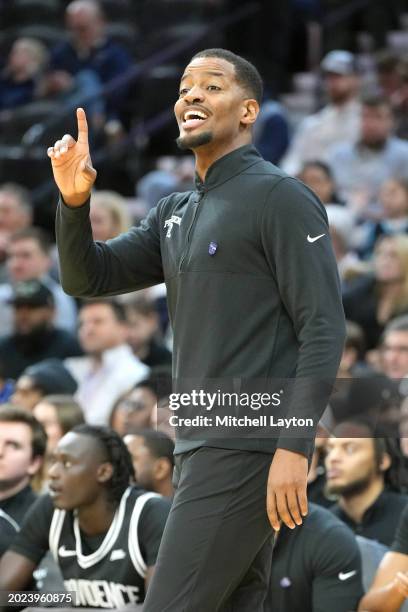 Head coach Kim English of the Providence Friars signals to his players during a college basketball game against the Villanova Wildcats at Wells Fargo...