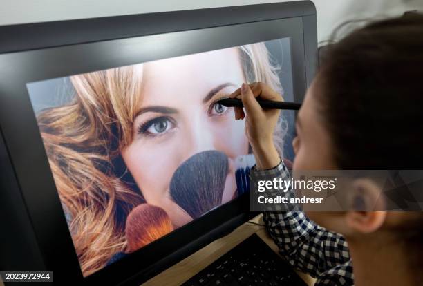 photo editor student retouching a photo at the university - multimedia learning stock pictures, royalty-free photos & images