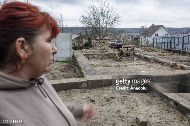 Natalia, living in Gostomel, a town located near Kyiv and it has been heavily impacted by the ongoing attacks, stands next to her house as she speaks...
