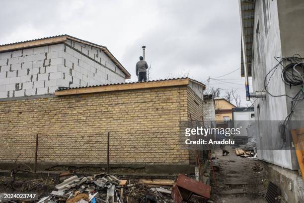 Citizens try to fix their damaged parts of their houses in Gostomel, a town located near Kyiv and it has been heavily impacted by the ongoing...