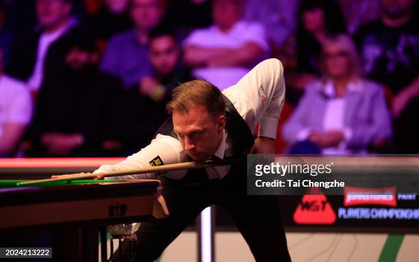 Judd Trump of England plays a shot in the first round match against Chris Wakelin of England on day one of 2024 Players Championship at Telford...