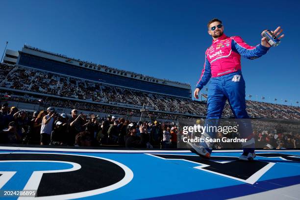Ricky Stenhouse Jr., driver of the Boost by Kroger.Cottonelle Chevrolet, walks onstage during driver intros prior to the NASCAR Cup Series Daytona...