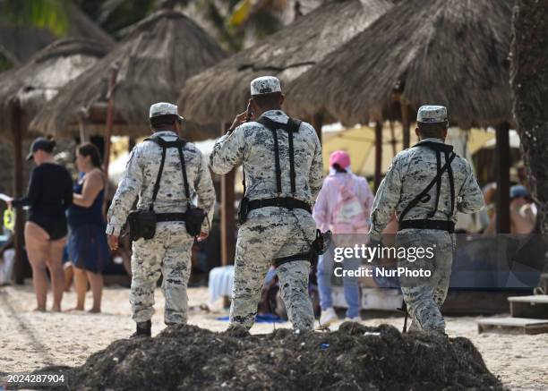 Mexican Army personnel patrolling the sandy shores of Puerto Morelos beach, on December 17 in Puerto Morelos, Quintana Roo, Mexico.