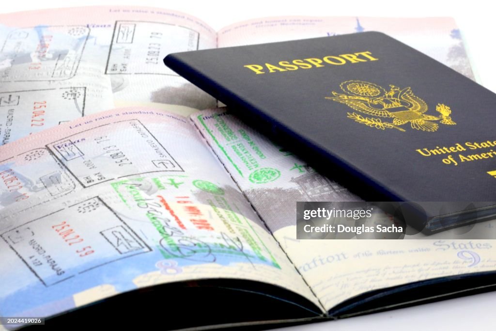 Travelers passport and international entry stamps