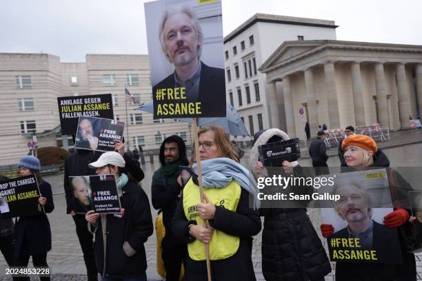 People gather outside the U.S. Embassy to demand freedom for Wikileaks founder Julian Assange on February 20, 2024 in Berlin, Germany. Assange and...