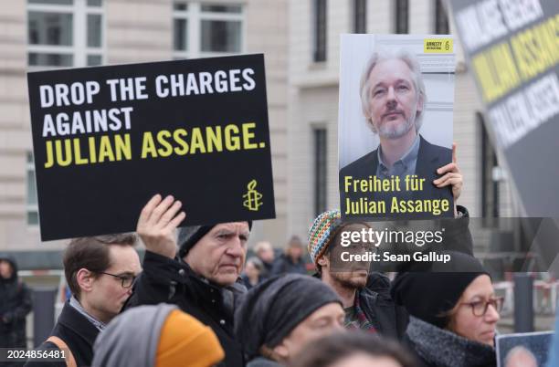 People gather with signs that read: "Freedom for Julian Assange" to demand freedom for Wikileaks founder Julian Assange on February 20, 2024 in...