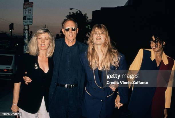 American actor Bruce Dern with his arms around his partner Andrea Beckett and daughter, American actress Laura Dern, at the premiere of 'After Dark,...