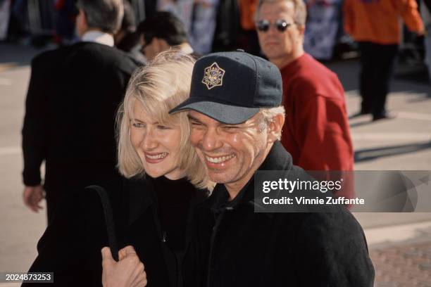 American actors Laura Dern and Billy Bob Thornton attend the premiere of Troy Miller's 'Jack Frost' at the Mann Village Theatre in Westwood,...