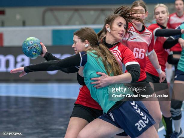 Violeta Komarova №20 of HC Sumy-U fights for the ball against Yuliya Poradnyk №23 of HC Spartak Kyiv during the Women's Handball Cup of Ukraine...