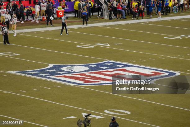 The logo of the NFL on the field during the Super Bowl LVIII match between San Francisco 49ers and Kansas City Chiefs at Allegiant Stadium on...