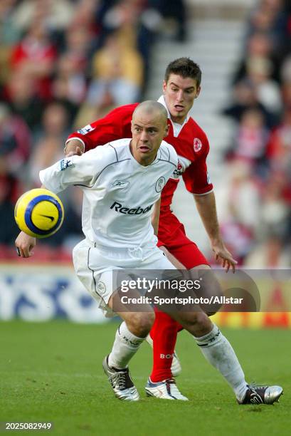 November 7: Stelios Giannakopoulos of Bolton Wanderers and Franck Queudrue of Middlesbrough challenge during the Premier League match between...