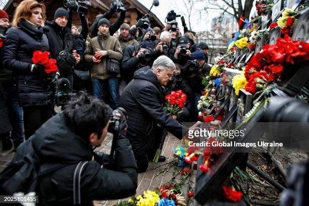 Former President of Ukraine Petro Poroshenko with his wife Maryna put flowers and candle to memorial to the Heavenly Hundred during commemoration...