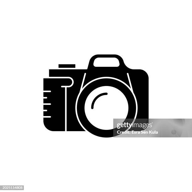 dslr camera solid icon design on a white background. this black flat icon suits infographics, web pages, mobile apps, ui, ux, and gui designs. - professional camera white background stock illustrations