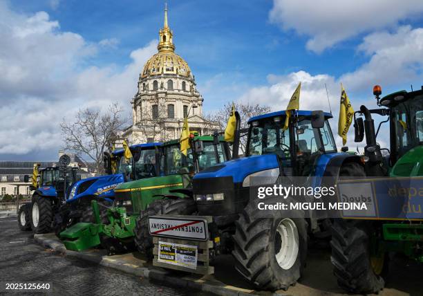 This photograph taken on February 23 shows parked tractors of French farmers during a demonstration led by the Coordination Rurale agricultural...