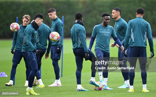 Bukayo Saka of Arsenal reacts during an Arsenal training session ahead of the UEFA Champions League match against Porto at London Colney on February...