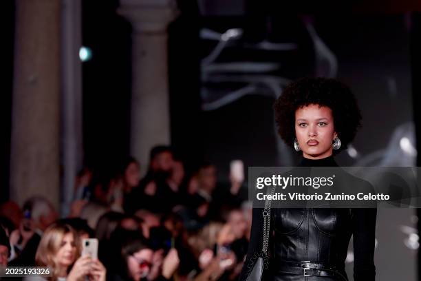 Model walks the runway at the Cult fashion show during the Milan Fashion Week Womenswear Fall/Winter 2024-2025 on February 20, 2024 in Milan, Italy.