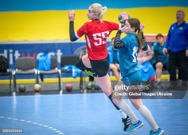 Anastasia Orzhakhovska №55 of HC Spartak Kyiv fights for the ball against Daria Yakubovych №15 of HC Sumy-U during the Women's Handball Cup of...