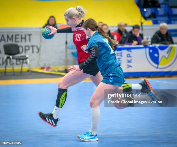 Anastasia Orzhakhovska №55 of HC Spartak Kyiv fights for the ball against Daria Yakubovych №15 of HC Sumy-U during the Women's Handball Cup of...