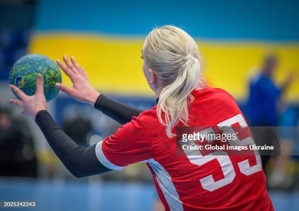 Anastasia Orzhakhovska №55 of HC Spartak Kyiv throws the ball, playing against HC Sumy-U players during the Women's Handball Cup of Ukraine 2023-2024...