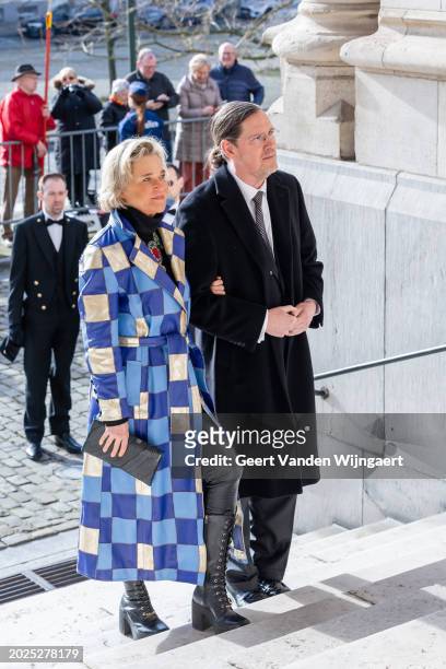 Princess Delphine of Belgium and her husband James O'Hare arrive for the annual mass in memory of deceased members of the Belgian Royal Family at...