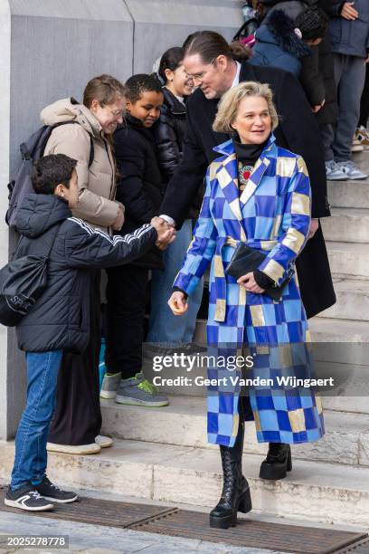 Princess Delphine of Belgium greets people after the annual mass in memory of deceased members of the Belgian Royal Family at Eglise Notre-Dame de...