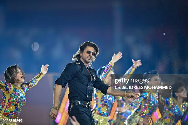 Bollywood actor Shah Rukh Khan performs for the opening ceremony of 2024 Women's Premier League before the start of first Twenty20 cricket match...