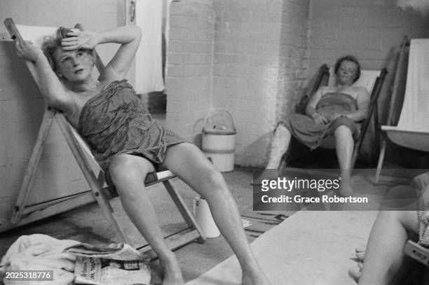 Clients at the Savoy, a women's Turkish bath on Duke of York Street, London, UK, 1951. Original Publication: Picture Post - 5597 - Ladies' Turkish...