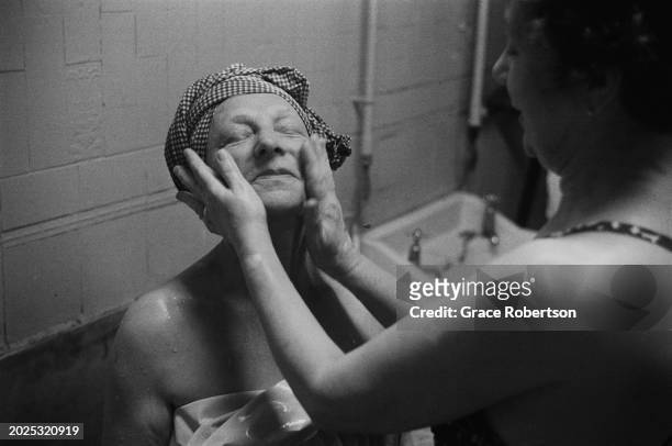 Client undergoing beauty treatment at the Savoy, a women's Turkish bath on Duke of York Street, London, UK, 1951. Original Publication: Picture Post...