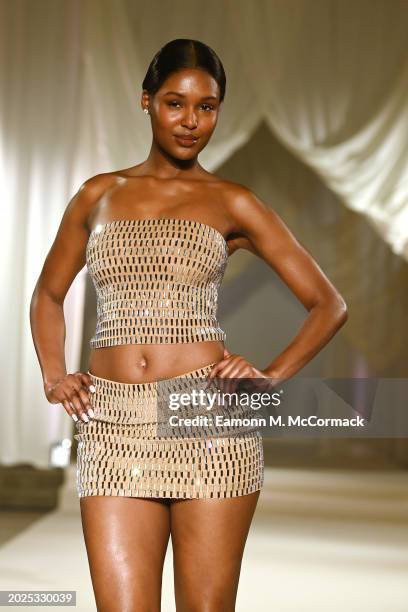 Model walks the runway at the Oh Polly Runway Show During London Fashion Week 2024 at St. John's Hyde Park on February 17, 2024 in London, England.