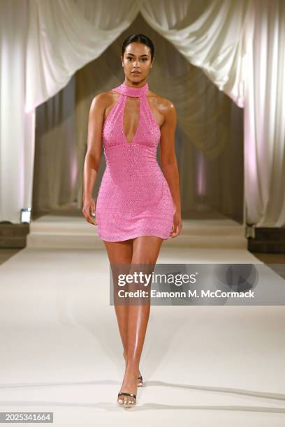 Model walks the runway at the Oh Polly Runway Show During London Fashion Week 2024 at St. John's Hyde Park on February 17, 2024 in London, England.