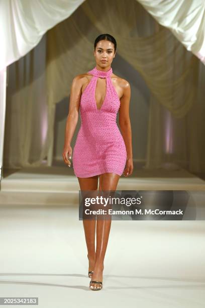 Model walks the runway at the Oh Polly Runway Show During London Fashion Week 2024 at St. John's Hyde Park on February 17, 2024 in London, England.