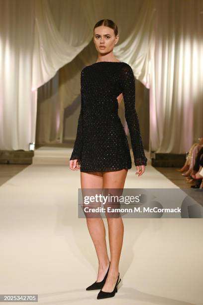 Model walks the runway at the Oh Polly Runway Show During London Fashion Week 2024 at St. John's Hyde Park on February 17, 2024 in London, England.