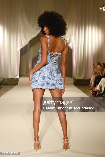 Model walks the runway at the Oh Polly Runway Show During London Fashion Week 2024 at St. John's Hyde Park on February 17, 2024 in London, England.