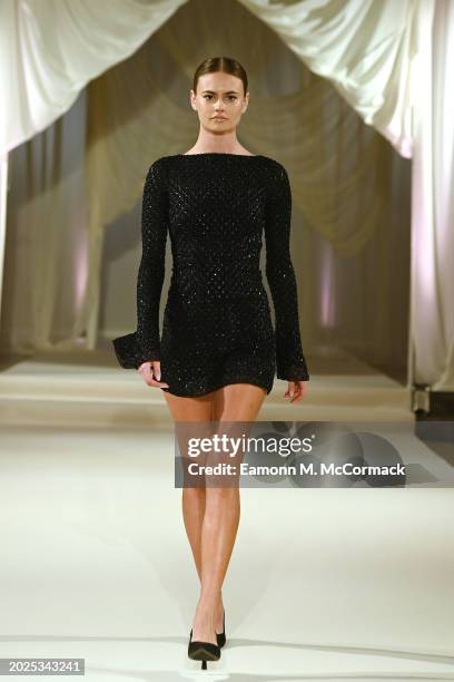 Model walks the runway at the Oh Polly Runway Show During London Fashion Week 2024 at St. John's Hyde Park on February 17, 2024 in London, England.