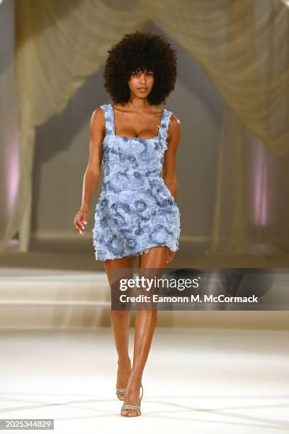 Model walks the runway at the Oh Polly Runway Show During London Fashion Week 2024 at St. John's Hyde Park on February 17, 2024 in London, England.