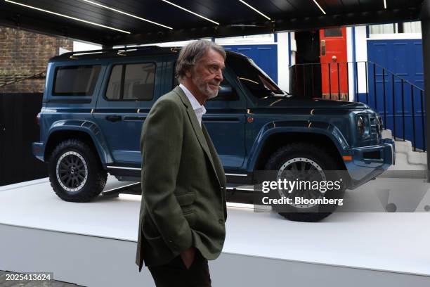Billionaire Jim Ratcliffe, chairman and founder of Ineos Group Holdings Plc, alongside a model of the Ineos Fusilier electric sport utility vehicle ,...