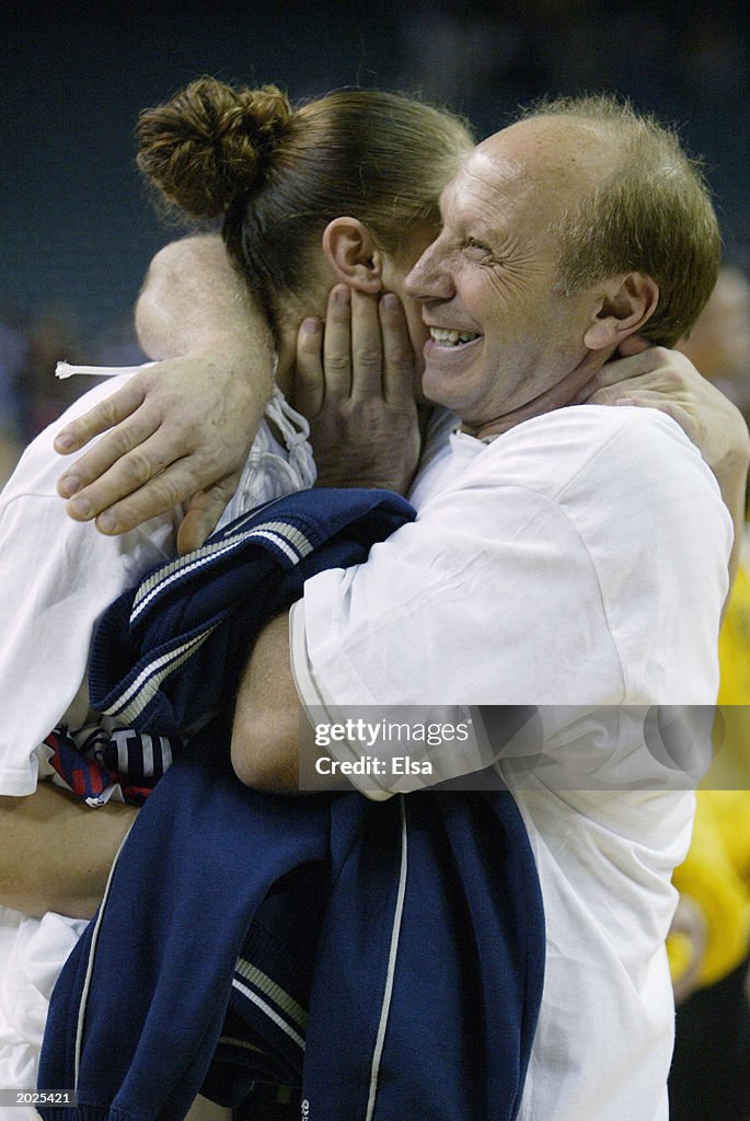 Mario Taurasi hugs his daughter Diana Taurasi of the University of