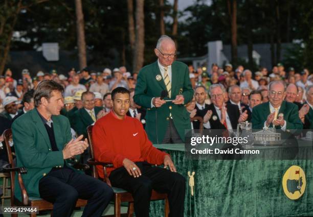 United States Golf Association official Will Nicholson announces Tiger Woods from the United States is to be presented with the Masters Green Jacket...