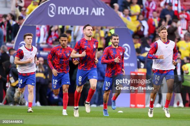 Marcos Llorente, Angel Correa, Saul Ñiguez, Samuel Lino and Pablo Barrios of Atletico de Madrid warms up prior to the LaLiga EA Sports match between...