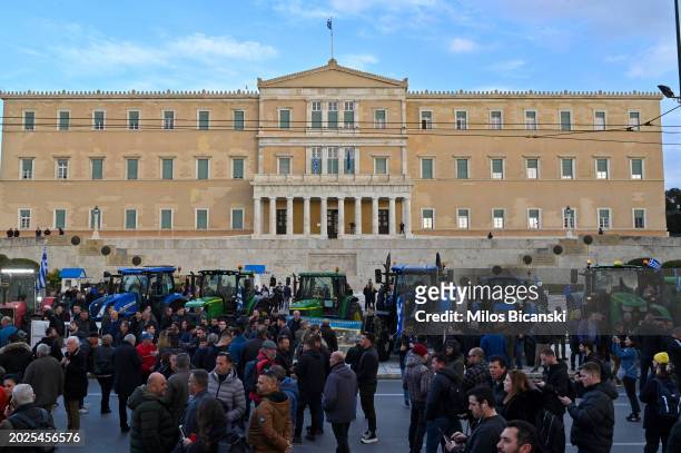 Greek farmers, with their tractors, protest near the Greek parliament on February 20, 2024 in Athens, Greece. After weeks of negotiation between the...