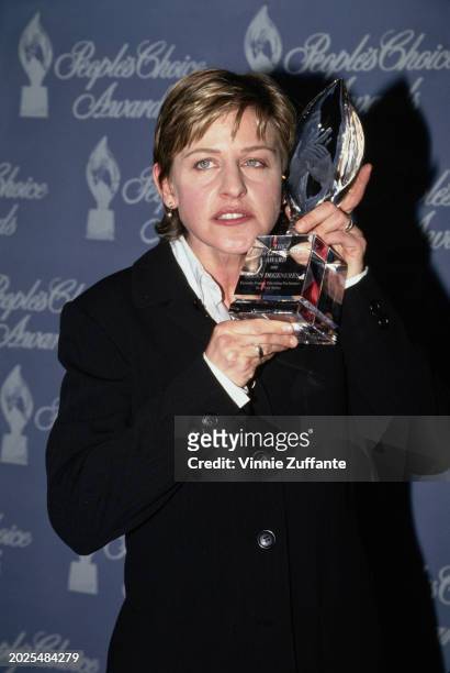American television host and comedian Ellen DeGeneres in the press room of the 21st People's Choice Awards, held on Sound Stage 12 at Universal...