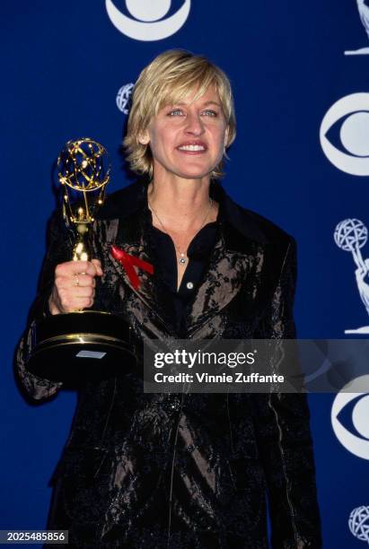 American television host and comedian Ellen DeGeneres in the press room of the 49th Primetime Emmy Awards, held at the Pasadena Civic Auditorium in...