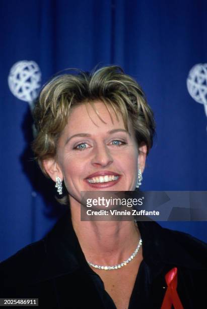 American television host and comedian Ellen DeGeneres, wearing a black suit, in the press room of the 46th Primetime Emmy Awards, held at the...