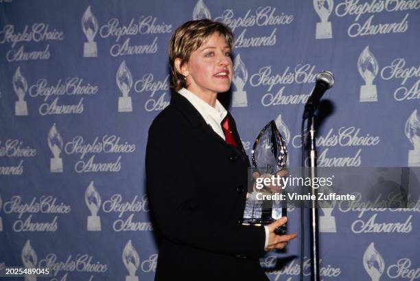 American television host and comedian Ellen DeGeneres in the press room of the 21st People's Choice Awards, held on Sound Stage 12 at Universal...